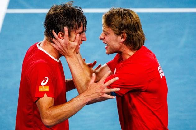 Belgian Raphael Collignon and celebrates with Zizou Bergs after winninga a tennis match between Belgian Collignon and Australian Thompson, during the qualifier of the Davis Cup, Sunday 14 September 2025, in Sydney, Australia. Belgium and Australia will compete this weekend in the second round of the Davis Cup qualifiers. PATRICKxHAMILTON  x134207918x