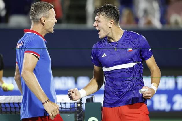 Czech non-playing captain Tomas Berdych, left, and Jakub Mensik of Czech Republic celebrate after winning the USA vs Czech Republic qualifying match to advance to the final group of the Davis Cup 2025 at the Delray Beach Tennis Center in Delray Beach, USA, September 14, 2025. (CTKxPhoto PavelxLebeda) CTKPhotoF202509140000401  CTKPhotoF202509140000401