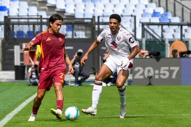 Roma™s Paulo Dybala and Torino s Saul Coco during the Serie A Enilive soccer match between AS Roma and Torino FC at the Rome s Olympic stadium, Italy - Sunday, September 14, 2025. - Soccer.  Copyright: xFabrizioxCorradetti LaPressex