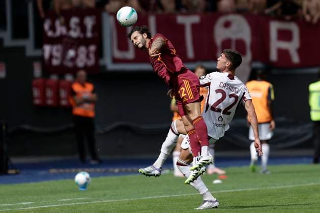 Italy: Serie a football match AS Roma vs Torino Roma™s Spanish defender Mario Hermoso challenges for the ball with Torino s Italian midfielder Cesare Casadei during the Serie A football match between AS Roma vs Torino at the Olimpico Stadium in Rome, Italy on September 14, 2025. _BPH9737 Copyright: xAntonioxBalascox