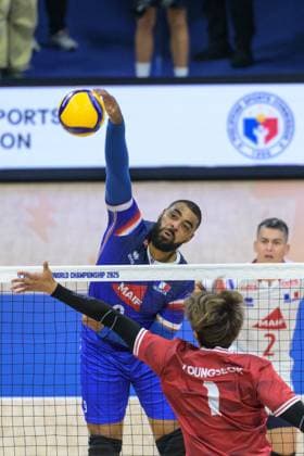 September 14, 2025, Quezon City, Manila, Philippines: France vs Korea in the Pool Phase during the FIVB Mens Volleyball World Championship, WM, Weltmeisterschaft 2025 in Manila, Philippines. France wins the match in 3 straight sets. France s Earvin NGAPETH at the net Quezon City Philippines - ZUMAr144 20250914_zap_r144_055 Copyright: xJaynexRussellx