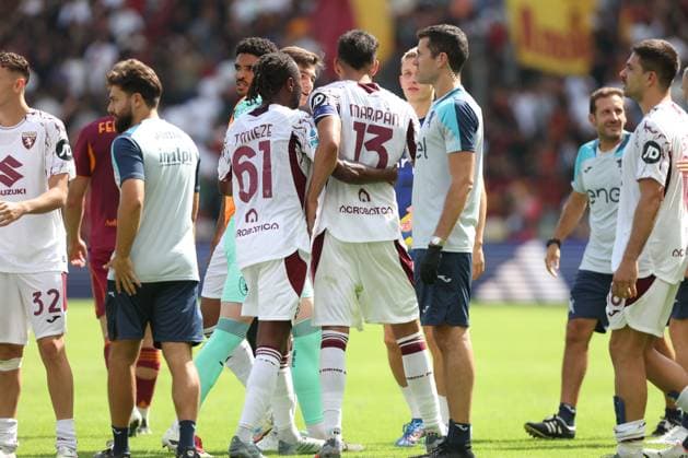Football: Serie A Enilive 2025-2026 match AS Roma and Torino FC Rome, Italy - September 14, 2025: Gullermo Maripan of Torino argues with his teammate Ivan Ilic of Torino at the end of the Serie A Enilive 2025-2026 football match between AS Roma and Torino FC at Olympic Stadium. rome olympic stadium italy italy Copyright: xmarcoxiacobucci