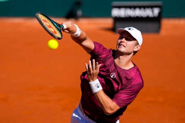 September 14, 2025, Malaga, Malaga, SPAIN: Johannes Ingildsen of Denmark in action against Jaume Munar and Pedro Martinez of Spain during their menÃ¢â‚¬â ¢s doubles tennis match to 2025 Davis Cup Qualifiers Second Round between Spain and Denmark at Club Tennis Puente Romano on September 14, 2025, in Malaga, Spain. Malaga SPAIN - ZUMAa181 20250914_zaa_a181_039 Copyright: xJoaquinxCorcherox