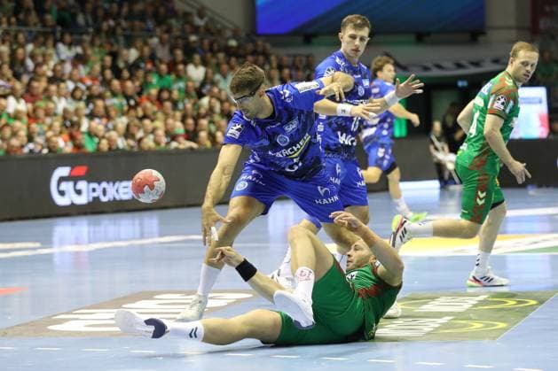 14 09 2025, xtgx, SC Magdeburg TVB Stuttgart v l Omar Ingi Magnusson Magdeburg, 14 , Kai Haefner Häfner, Stuttgart, 34 duel, duel, fight, tackle Magdeburg