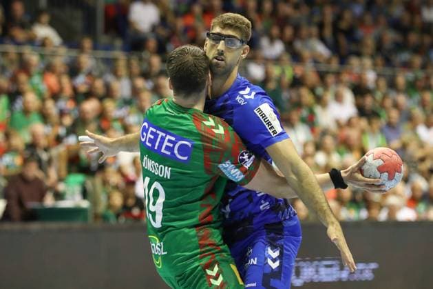 14 09 2025, xtgx, SC Magdeburg TVB Stuttgart v l Elvar Orn Jonsson Magdeburg, 19 , Antonio Seradilla Stuttgart, 5 duel, duel, fight, tackle Magdeburg