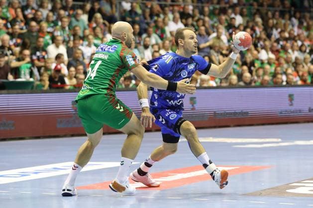 14 09 2025, xtgx, SC Magdeburg TVB Stuttgart v l Oscar Bergendahl Magdeburg, 54 , Kai Haefner Häfner, Stuttgart, 34 duel, duel, fight, tackle Magdeburg