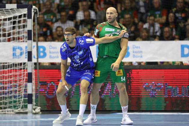 14 09 2025, xtgx, SC Magdeburg TVB Stuttgart v l Antonio Seradilla Stuttgart, 5 , Oscar Bergendahl Magdeburg, 54 duel, duel, fight, tackle Magdeburg