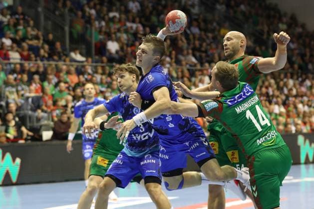 14 09 2025, xtgx, SC Magdeburg TVB Stuttgart v l Simone Mengon Stuttgart, 15 , Oscar Bergendahl Magdeburg, 54 , Omar Ingi Magnusson Magdeburg, 14 duel, duel, fight, tackle Magdeburg