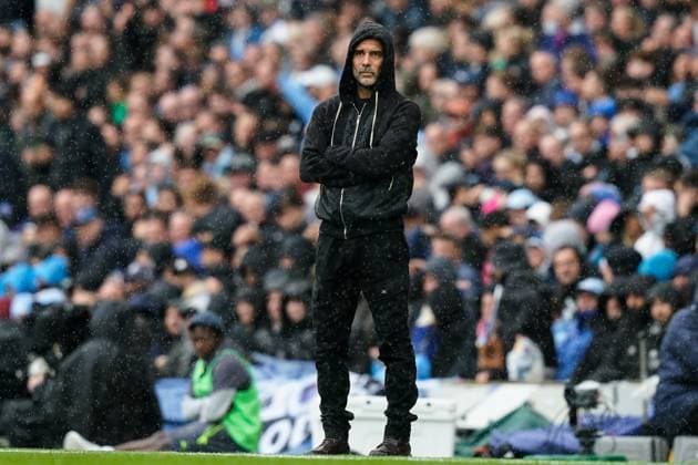 Manchester, England, 14th September 2025. Pep Guardiola manager of Manchester City watches on during the Manchester City vs Manchester United, ManU Premier League match at the Etihad Stadium, Manchester. Picture credit should read: Andrew Yates Sportimage EDITORIAL USE ONLY. No use with unauthorised audio, video, data, fixture lists, club league logos or live services. Online in-match use limited to 120 images, no video emulation. No use in betting, games or single club league player publications. SPI_026_AY_MCI_MUFC SPI-4139-0026