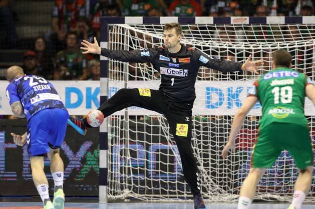 14 09 2025, xtgx, SC Magdeburg TVB Stuttgart v l Patrick Zieker Stuttgart, 25 , Sergey Hernandez Ferrer Magdeburg, 1 save, holds the ball, catches the ball, saves seven-meter penalty Magdeburg