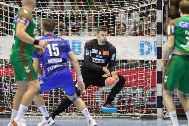 14 09 2025, xtgx, SC Magdeburg TVB Stuttgart v l Simone Mengon Stuttgart, 15 , Sergey Hernandez Ferrer Magdeburg, 1 save, holds the ball, catches the ball, parries Magdeburg