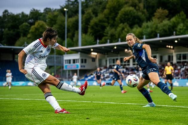 GPFBL TSG Hoffenheim Eintracht Frankfurt 14 09 2025 Remina Chiba 15, Eintracht Frankfurt Women shoots on goal while Jamilla Rankin 5 TSG defends GPFBL TSG Hoffenheim - Eintracht Frankfurt, Dietmar Hopp Stadion in Hoffenheim, on 14 09 2025 DFB REGULATIONS PROHIBIT ANY USE OF PHOTOGRAPHS AS IMAGE SEQUENCES AND OR QUASI VIDEO GPFBL TSG Hoffenheim - Eintracht Frankfurt, Dietmar Hopp Stadion in Hoffenheim, on 14 09 2025 DFB REGULATIONS PROHIBIT ANY USE OF PHOTOGRAPHS AS IMAGE SEQUENCES AND OR QUASI VIDEO Copyright: xBEAUTIFULxSPORTS Gelhardtx