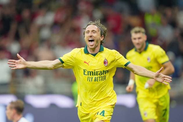 AC Milan s Luka Modric celebrates after scoring 1-0 during the Serie A soccer match between Milan and Bologna at the San Siro Stadium in Milan , north Italy - Sunday , September 14 , 2025. - Soccer .  Copyright: xSpada LaPressex