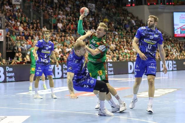 14 09 2025, xtgx, SC Magdeburg TVB Stuttgart v l Jonas Truchanovicius Stuttgart, 37 , Gisli Thorgeir Kristjansson Magdeburg, 10 duel, duel, fight, tackle Magdeburg