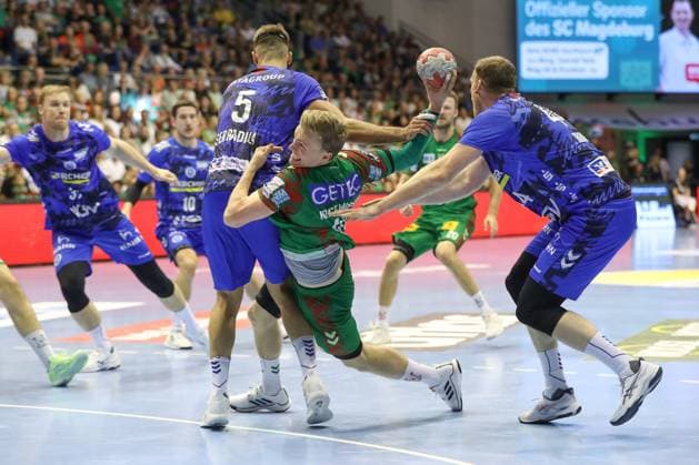 14 09 2025, xtgx, SC Magdeburg TVB Stuttgart v l Antonio Seradilla Stuttgart, 5 , Gisli Thorgeir Kristjansson Magdeburg, 10 , Lenny Rubin Stuttgart, 44 duel, duel, fight, tackle Magdeburg