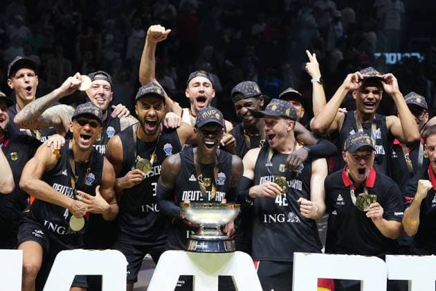 (250915) -- RIGA, Sept. 15, 2025 -- Team Germany celebrate winning the FIBA EuroBasket 2025 final match between Germany and T¨¹rkiye in Riga, Latvia, on Sept. 14, 2025. (Photo by Xinhua) (SP)LATVIA-RIGA-BASKETBALL-FIBA-EUROBASKET-GERMANY VS T?RKIYE EdijsxPalens 