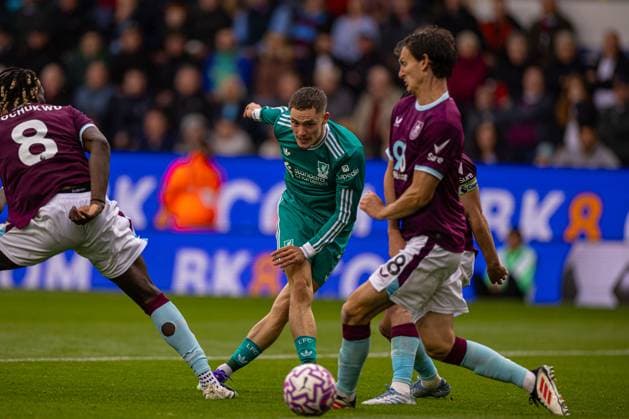 (250915) -- BURNLEY, Sept. 15, 2025 -- Liverpool s Florian Wirtz (C) shoots during the English Premier League match between Burnley FC and Liverpool FC in Burnley, Britain, on Sept. 14, 2025. FOR EDITORIAL USE ONLY. NOT FOR SALE FOR MARKETING OR ADVERTISING CAMPAIGNS. NO USE WITH UNAUTHORIZED AUDIO, VIDEO, DATA, FIXTURE LISTS, CLUB LEAGUE LOGOS OR LIVE SERVICES. ONLINE IN-MATCH USE LIMITED TO 45 IMAGES, NO VIDEO EMULATION. NO USE IN BETTING, GAMES OR SINGLE CLUB LEAGUE PLAYER PUBLICATIONS. (SP)BRITAIN-BURNLEY-FOOTBALL-PREMIER LEAGUE-BURNLEY VS LIVERPOOL LixYing 