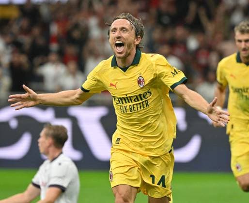 (250915) -- MILAN, Sept. 15, 2025 -- AC Milan s Luka Modric celebrates his goal during a Serie A football match between AC Milan and Bologna in Milan, Italy, Sept. 14, 2025. (Photo by Xinhua) (SP)ITALY-MILAN-FOOTBALL-SERIE A-AC MILAN VS BOLOGNA AlbertoxLingria 