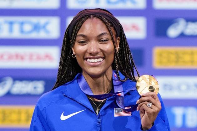 Athletics: World championships in Tokyo Gold medalist Tara Davis-Woodhall of the United States poses with her gold medal during a medal ceremony for the women s long jump event at the World Athletics Championships at the National Stadium in Tokyo on Sept. 15, 2025.  A14AA0004851327P