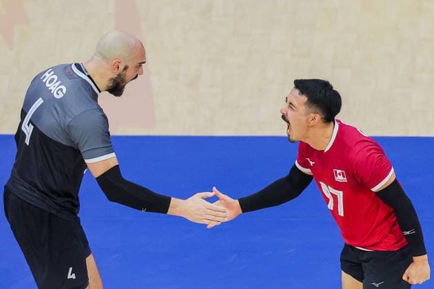 (250915) -- QUEZON CITY, Sept. 15, 2025 -- Nicholas Hoag (L) and Landon Currie of Canada celebrate after scoring a point during the pool G match between Canada and Japan at the FIVB Men s World Championship, WM, Weltmeisterschaft 2025 in Quezon City, the Philippines, on Sept. 15, 2025. ) (SP) THE PHILIPPINES-QUEZON CITY-FIVB MEN S WORLD CHAMPIONSHIP 2025-CAN VS JPN ROUELLExUMALI 
