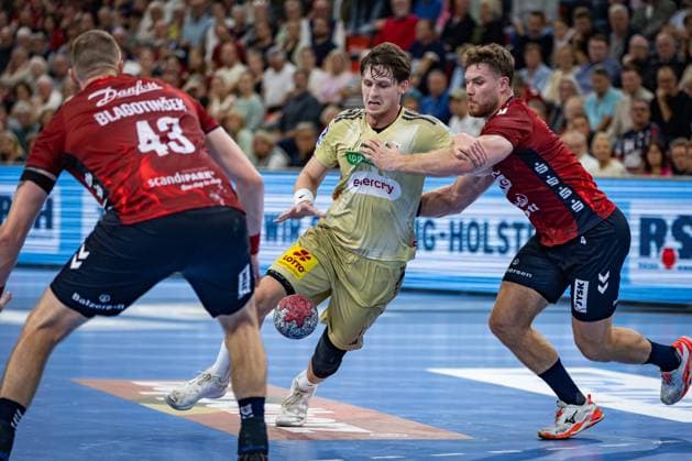 DAIKIN HBL SG Flensburg Handewitt vs TSV Hannover Burgdorf 15 09 25 Maxim Orlov No 11, TSV Hannover Burgdorf in attack DAIKIN HBL SG Flensburg Handewitt vs TSV Hannover Burgdorf, GP JOULE Arena Flensburg on 15 09 25 Copyright: xBEAUTIFULxSPORTS MarioxM.xKobergx