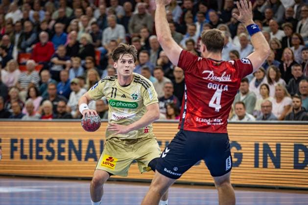 DAIKIN HBL SG Flensburg Handewitt vs TSV Hannover Burgdorf 15 09 25 Maxim Orlov Nr 11, TSV Hannover Burgdorf vs Johannes Golla Nr 04, SG Flensburg Handewitt DAIKIN HBL SG Flensburg Handewitt vs TSV Hannover Burgdorf, GP JOULE Arena Flensburg on 15 09 25 Copyright: xBEAUTIFULxSPORTS MarioxM.xKobergx