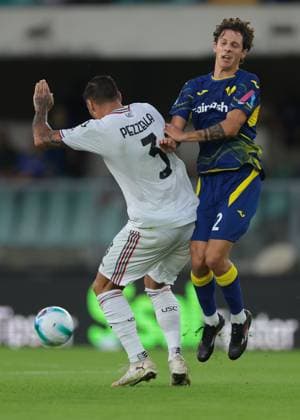 Verona, Italy, 15th September 2025. Giuseppe Pezzella of US Cremonese challenges Domagoj Bradaric of Hellas Verona during the Hellas Verona vs US Cremonese Serie A match at Marc Antonio Bentegodi, Verona. Picture credit should read: Jonathan Moscrop Sportimage EDITORIAL USE ONLY. No use with unauthorised audio, video, data, fixture lists, club league logos or live services. Online in-match use limited to 120 images, no video emulation. No use in betting, games or single club league player publications. SPI_062_JM_HELLAS_CREMONESE_ SPI-4121-0061
