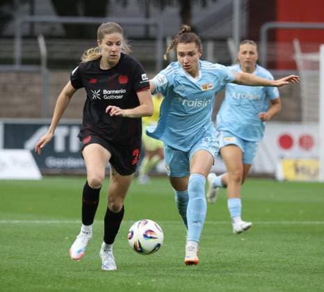 Lilla Turanyi B04 and Sophie Weidauer FCU , Leverkusen, Germany 15 09 2025, Womens Bundesliga, Matchday 2, Bayer 04 Leverkusen 1 FC Union Berlin