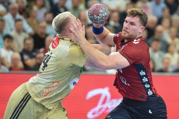 Handball I Men I Season 2025 2026 I Bundesliga I 4 Matchday I SG Flensburg Handewitt TSV Hannover Burgdorf I 15 09 2025 Justus Fischer 54, TSV Hannover Burgdorf , Johannes Golla 4, SG Flensburg Handewitt Copyright: xLobeca JanxKirschnerx