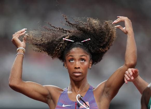 (250916) -- TOKYO, Sept. 16, 2025 -- Alaysha Johnson of the United States reacts after the women s 100m hurdles semifinal at the 2025 World Athletics Championships in Tokyo, Japan, Sept. 15, 2025. ) (SP)JAPAN-TOKYO-ATHLETICS-WORLD ATHLETICS CHAMPIONSHIPS-WOMEN S 100M HURDLES-SEMIFINAL JuxHuanzong 
