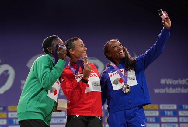 (250916) -- TOKYO, Sept. 16, 2025 -- Gold medalist Ditaji Kambundji (C) of Switzerland, silver medalist Tobi Amusan of Nigeria (L) and bronze medalist Grace Stark of the United States pose for a selfie during the women s 100m hurdles awarding ceremony at the 2025 World Athletics Championships in Tokyo, Japan, Sept. 16, 2025. ) (SP)JAPAN-TOKYO-ATHLETICS-WORLD ATHLETICS CHAMPIONSHIPS-WOMEN S 100M HURDLES-AWARDING CEREMONY JiangxHan 