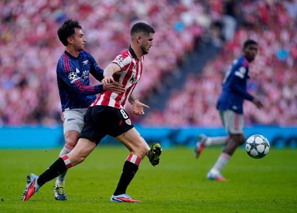 Martin Zubimendi of Arsenal in action against Oihan Sancet of Athletic Bilbao Athletic Bilbao v Arsenal, UEFA Champions League, Group Stage, Football, Estadio de San Mames, Bilbao, Spain - 16 Sep 2025Bilbao Estadio de San Mames Spain EDITORIAL USE ONLY No use with unauthorised audio, video, data, fixture lists, club league logos or live services. Online in-match use limited to 120 images, no video emulation. No use in betting, games or single club league player publications. Copyright: xSergioxRuiz Shutterstockx 15481341bn