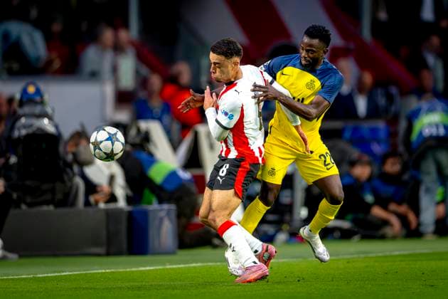 Union Saint Gilloise midfielder Ousseynou Niang, PSV Eindhoven defender Sergino Dest during the match PSV Royale Union Saint Gilloise at the Philips stadium for the Champions League phase Matchday 1 season 2025 2026 in EINDHOVEN, Netherlands on 16 september 2025, photo by Marcel van Dorst EYE4images DeFodi Images