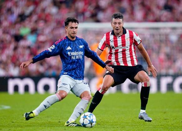 Mikel Merino of Arsenal in action against Aitor Paredes of Athletic Bilbao Athletic Bilbao v Arsenal, UEFA Champions League, Group Stage, Football, Estadio de San Mames, Bilbao, Spain - 16 Sep 2025Bilbao Estadio de San Mames Spain EDITORIAL USE ONLY No use with unauthorised audio, video, data, fixture lists, club league logos or live services. Online in-match use limited to 120 images, no video emulation. No use in betting, games or single club league player publications. Copyright: xSergioxRuiz Shutterstockx 15481341ck