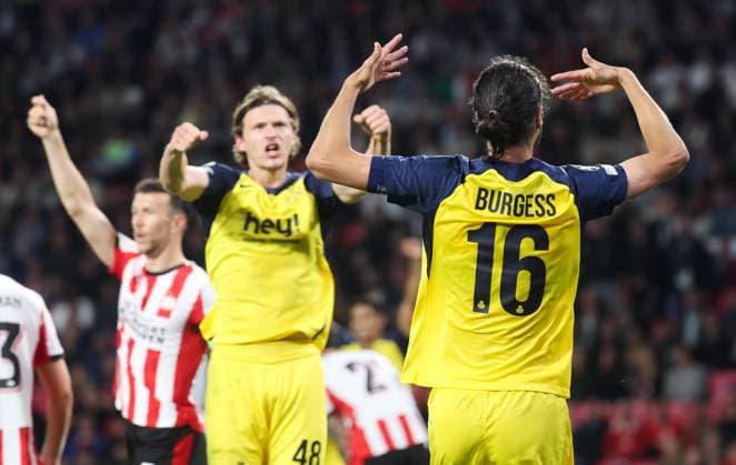 Union s Fedde Leysen and Union s Christian Burgess celebrate during a soccer game between Dutch team PSV Eindhoven and Belgian team Royale Union Saint-Gilloise, in Eindhoven, The Netherlands, on Tuesday 16 September 2025, on the opening day of the League phase of the UEFA Champions League tournament. VIRGINIExLEFOUR  x134450032x