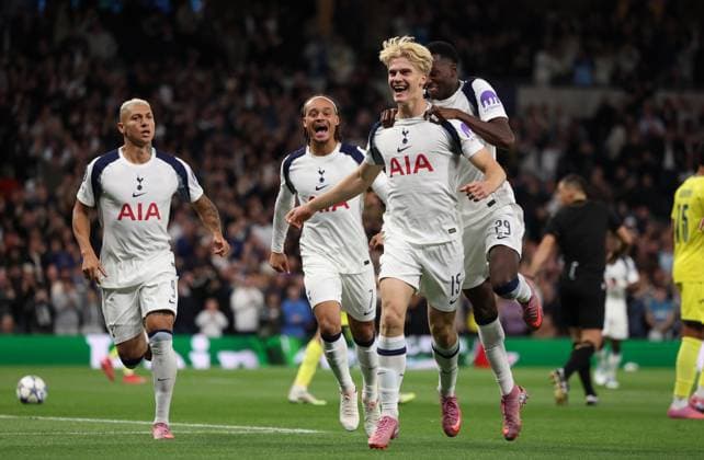 London, England, 16th September 2025. Lucas Bergvall of Tottenham Hotspur celebrates with team mates after Luiz Junior (not pictured) of Villarreal scores an own goal to make it 1-0 during the Tottenham Hotspur vs Villarreal UEFA Champions League match at the Tottenham Hotspur Stadium, London. Picture credit should read: Paul Terry Sportimage EDITORIAL USE ONLY. No use with unauthorised audio, video, data, fixture lists, club league logos or live services. Online in-match use limited to 120 images, no video emulation. No use in betting, games or single club league player publications. SPI_012_PT_Tottenham_Villarreal SPI-4141-0012