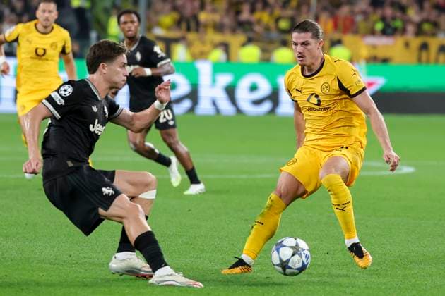 Andrea Cambiaso Juventus FC and Marcel Sabitzer Borussia Dortmund battle for the ball, UEFA Champions League 2025 26 League Phase MD1, Juventus v Borussia Dortmund, Juventus Stadium on September 16, 2025 in Turin, Italy Photo by Marco Steinbrenner DeFodi Images Andrea Cambiaso Juventus FC and Marcel Sabitzer Borussia Dortmund battle for the ball, UEFA Champions League 2025 26 League Phase MD1, Juventus v Borussia Dortmund, Juventus Stadium, September 16, 2025 in Turin, Italy Photo by Marco Steinbrenner DeFodi Images