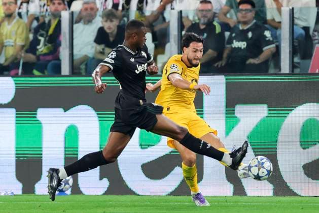 Pierre Kalulu Juventus FC and Ramy Bensebaini Borussia Dortmund battle for the ball, UEFA Champions League 2025 26 League Phase MD1, Juventus v Borussia Dortmund, Juventus Stadium on September 16, 2025 in Turin, Italy Photo by Marco Steinbrenner DeFodi Images Pierre Kalulu Juventus FC and Ramy Bensebaini Borussia Dortmund battle for the ball, UEFA Champions League 2025 26 League Phase MD1, Juventus v Borussia Dortmund, Juventus Stadium, September 16, 2025 in Turin, Italy Photo by Marco Steinbrenner DeFodi Images