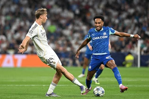 REAL MADRID CF v OLYMPIQUE DE MARSEILLE. CHAMPIONS LEAGUE 2025 2026. ROUND 1. Real Madrid CF s Dean Huijsen (l) and Olympique de Marseille s Pierre-Emerick Aubameyang during Champions League 2024 2025 Round 1 match. September 16,2025. (ALTERPHOTOS Jorge Ropero) MadridSpain  Copyright: xJorgexRoperox