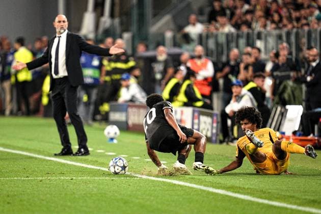 Juventus Lois Openda fights for the ball with Dortmund s Karim Adeyemi during the Uefa Champions League soccer match, between Juventus and Borussia Dortmund at the Allianz Stadium in Turin, north west Italy - Tuesday, September 16, 2025. - Soccer  Copyright: xMarcoxAlpozzi LaPressex