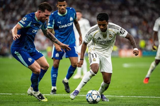 September 16, 2025, Madrid, Spain, Spain: Pierre-Emile HOJBJERG of Marseille and Rodrygo SILVA DE GOES of Real Madrid during the UEFA Champions League, League Phase MD1 match between Real Madrid CF and Olympique de Marseille (OM) at Santiago Bernabeu Stadium on September 16, 2025 in Madrid, Spain. Madrid Spain - ZUMAm308 20250916_zsp_m308_017 Copyright: xMatthieuxMirvillex