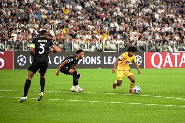 Dortmund s Karim Adeyemi score his goal during the Uefa Champions League soccer match, between Juventus and Borussia Dortmund at the Allianz Stadium in Turin, north west Italy - Tuesday, September 16, 2025. - Soccer  Copyright: xMarcoxAlpozzi LaPressex