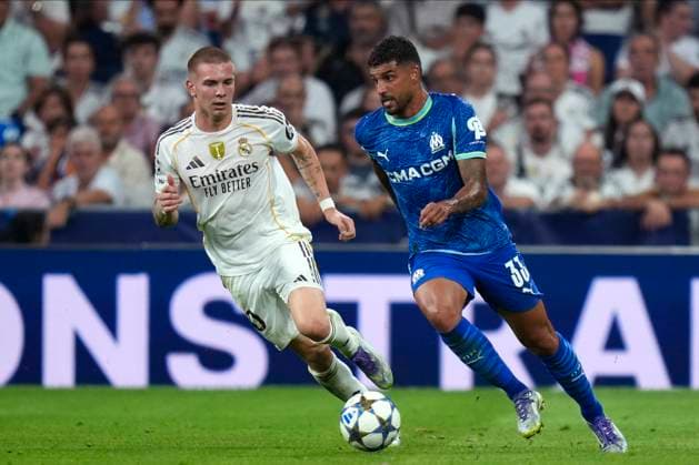 Franco Mastantuono of Real Madrid CF and Emerson of Olympique Marsella during the UEFA Champions League match between match between Real Madrid and Olympique de Marseille, on September 15, 2025. - 16 09 2025 - Spain Madrid Madrid -  LGMx xLexPictorium LePictorium_0314556