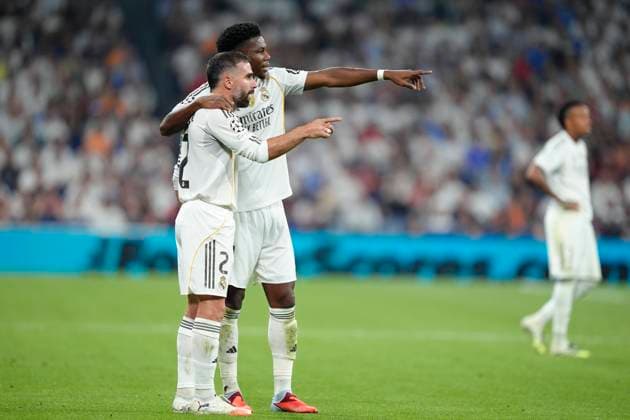 September 16, 2025, Madrid, Spain: AurÃ lien TchouamÃ ni of Real Madrid CF and Daniel Carvajal of Real Madrid CF are seen during the UEFA Champions League match between Real Madrid CF and Olympique de Marseille at the Santiago BernabÃ u. Final Score; Real Madrid 2 - 1 Olympique de Marseille Madrid Spain - ZUMAs197 20250916_aaa_s197_354 Copyright: xGokhanxTanerx