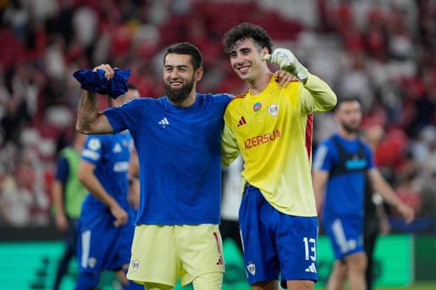 CHAMPIONS LEAGUE: BENFICA x QARABAG Shakhrudin Magomedaliyev of Qarabag FK (L) and Bahlul Mustafazade of Qarabag FK (R) celebrates their victory during UEFA Champions League 2025 26 League phase Matchday 1 between SL Benfica and Qarabag FK at Estadio da Luz in Lisbon, Portugal. 15 09 2025 Lisbon Estadio da Luz Lisbon Portugal Copyright: xBrunoxdexCarvalhox