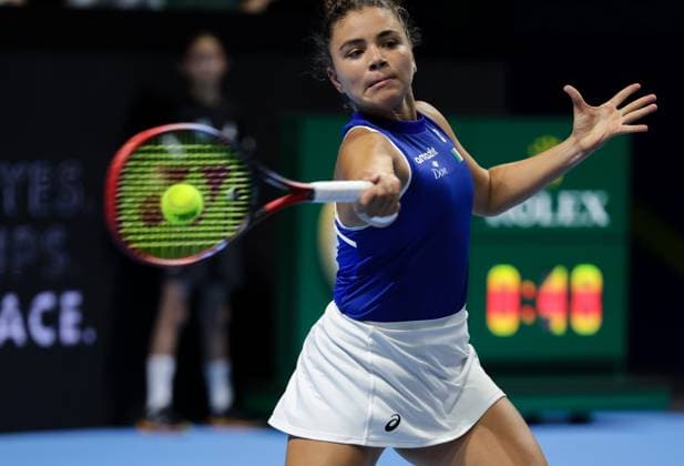 (250917) -- SHENZHEN, Sept. 17, 2025 -- Jasmine Paolini of Italy hits a return during the women s singles match against Wang Xinyu of China in the quarterfinal between China and Italy at the 2025 Billie Jean King Cup Finals in Shenzhen, south China s Guangdong Province, Sept. 16, 2025. ) (SP)CHINA-SHENZHEN-TENNIS-BILLIE JEAN KING CUP-CHINA VS ITALY (CN) MaoxSiqian 