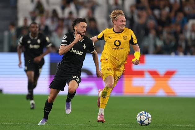 Turin, Italy, 16th September 2025. Joao Mario of Juventus is pursued by Julian Brandt of Borussia Dortmund as he breaks with the ball during the Juventus vs Borussia Dortmund UEFA Champions League match at Allianz Stadium, Turin. Picture credit should read: Jonathan Moscrop Sportimage EDITORIAL USE ONLY. No use with unauthorised audio, video, data, fixture lists, club league logos or live services. Online in-match use limited to 120 images, no video emulation. No use in betting, games or single club league player publications. SPI_139_JM_JUVE_BORUSSIA_ SPI-4122-0139