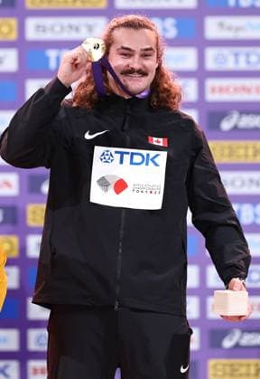 (250917) -- TOKYO, Sept. 17, 2025 -- Gold medalist Ethan Katzberg of Canada poses during the men s hammer throw awarding ceremony at the 2025 World Athletics Championships in Tokyo, Japan, Sept. 17, 2025. ) (SP)JAPAN-TOKYO-ATHLETICS-WORLD ATHLETICS CHAMPIONSHIPS-MEN S HAMMER THROW-AWARDING CEREMONY JiaxHaocheng 