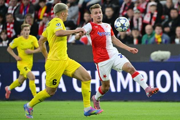 From left Jostein Maurstad Gundersen of Bodo Glimt and Michal Sadilek of Slavia in action during the Football Champions League 1st round match Slavia Praha vs Bodo Glimt in Prague, Czech Republic, September 17, 2025. (CTKxPhoto VitxSimanek) CTKPhotoP2025091707773  CTKPhotoP2025091707773