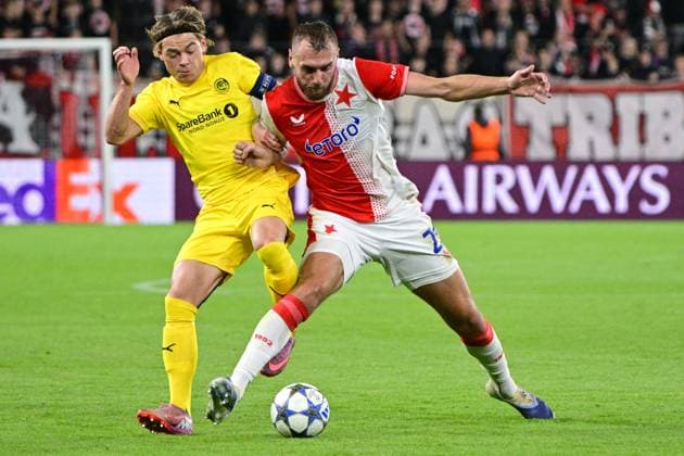 From left Patrick Berg of Bodo Glimt and Tomas Chory of Slavia in action during the Football Champions League 1st round match Slavia Praha vs Bodo Glimt in Prague, Czech Republic, September 17, 2025. (CTKxPhoto VitxSimanek) CTKPhotoP2025091708035  CTKPhotoP2025091708035